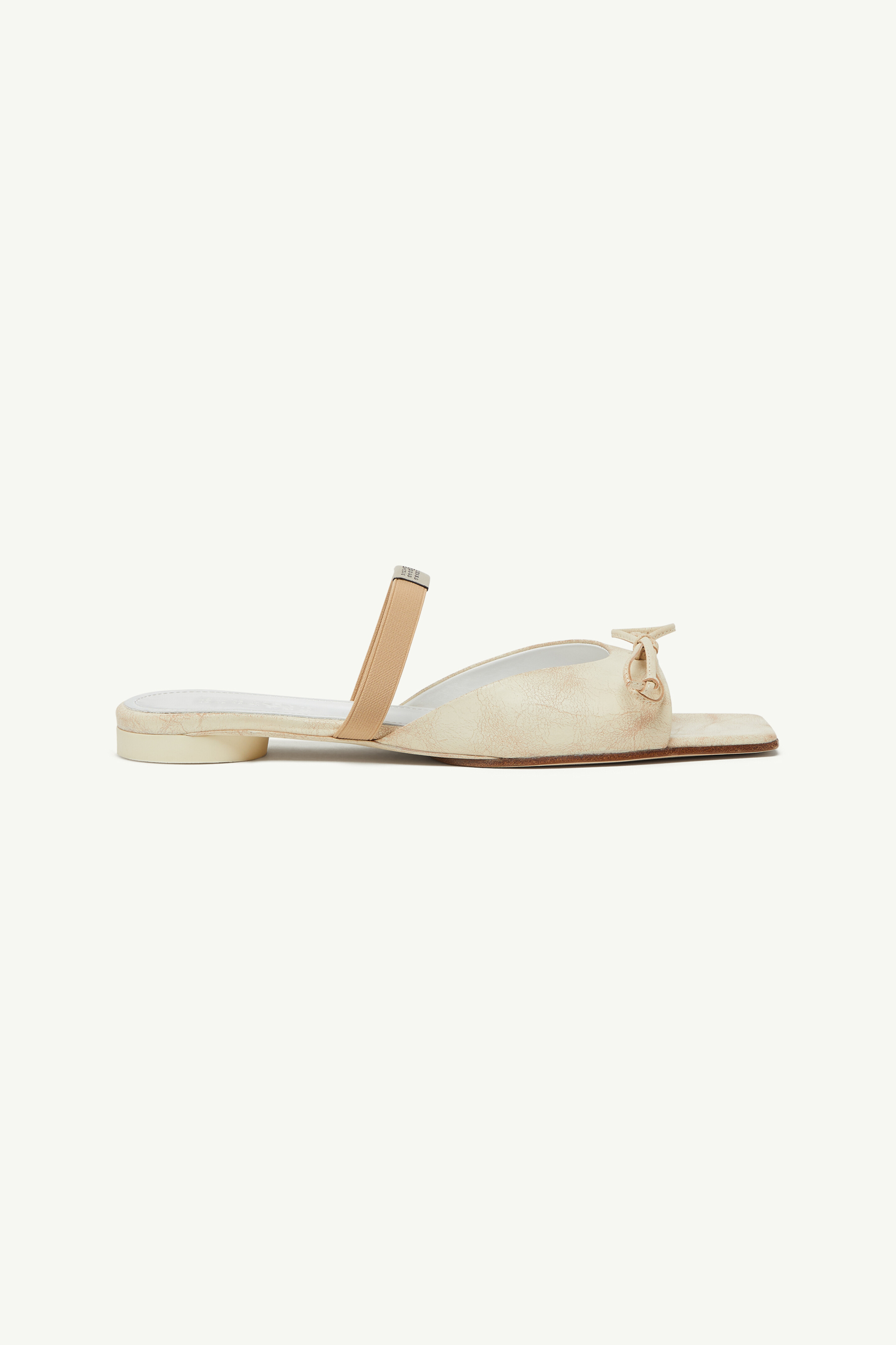 Bow-detailed leather slingback shoes